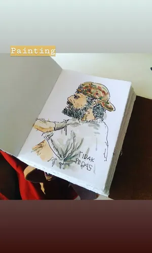Story Instagram: sketsa cat air seorang pria bertopi dan tanaman di halaman jurnal