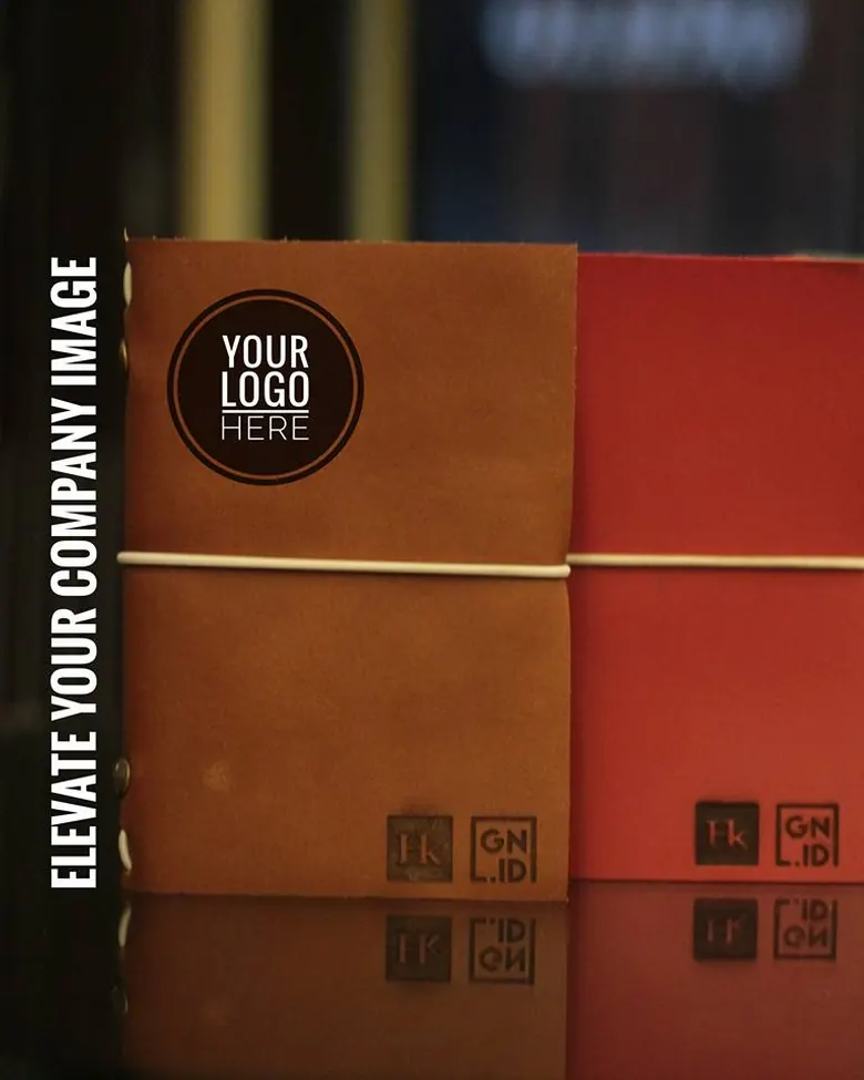 A leather journal mockup with a logo placeholder.