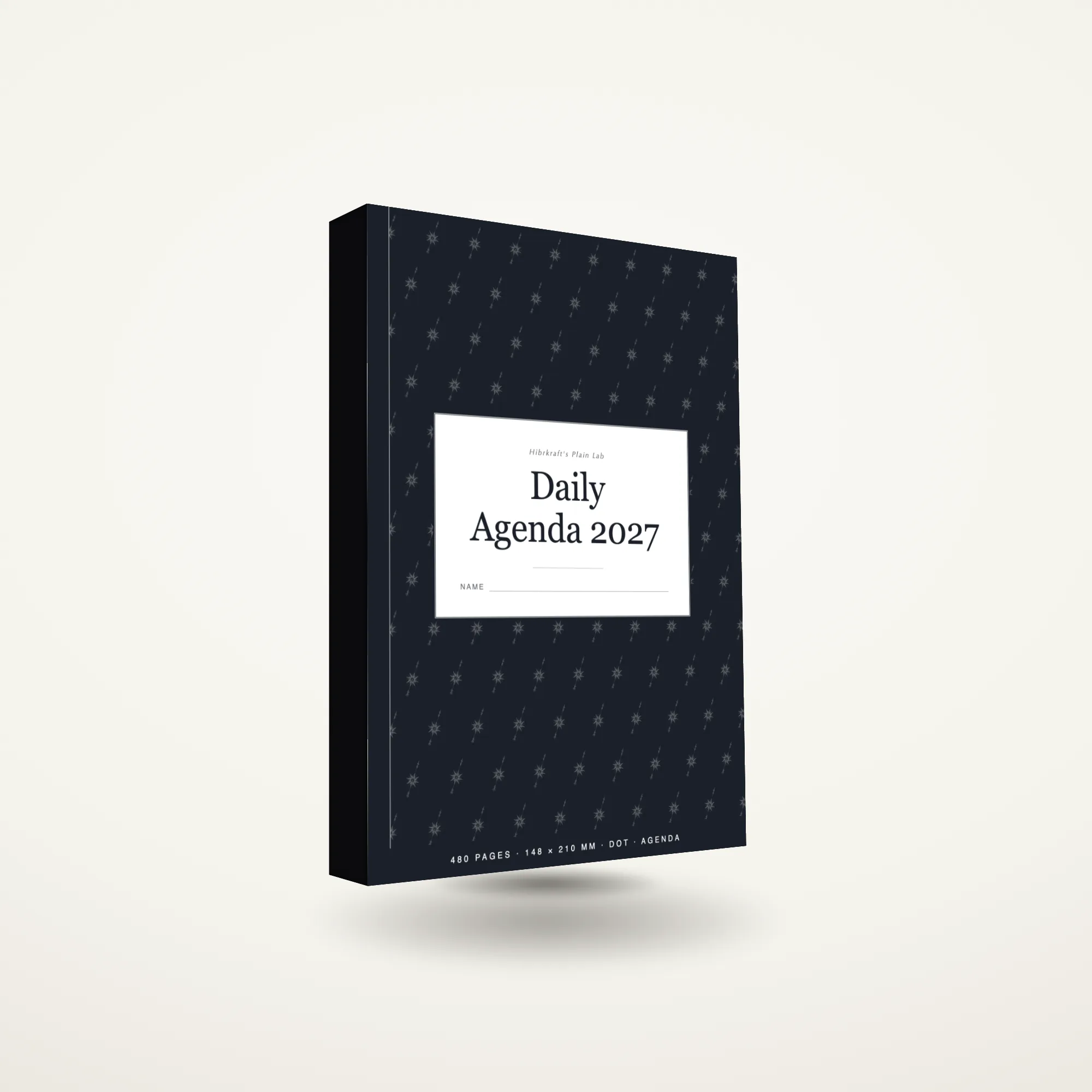 Daily Agenda 2027 berdiri tertutup, sampul matte, tebal, punggung sekitar 27 mm